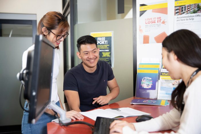 Student talking to Student Services