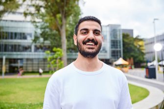 UNSW College Student standing outside - main walkwayy