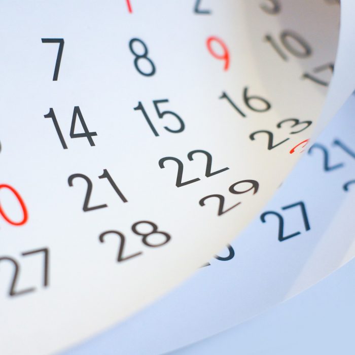 Close up a blue toned calendar page