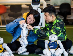 Students working with robots